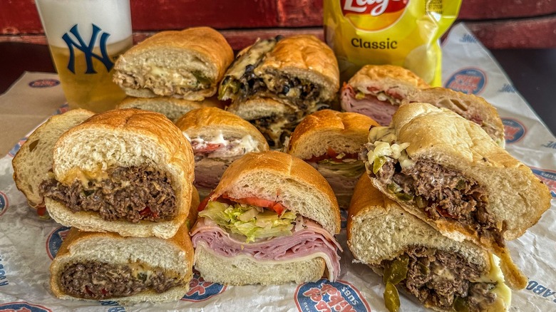 10 Jersey Mike's subs with a drink and Lay's chips