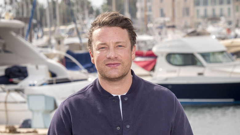 Jamie Oliver on a dock