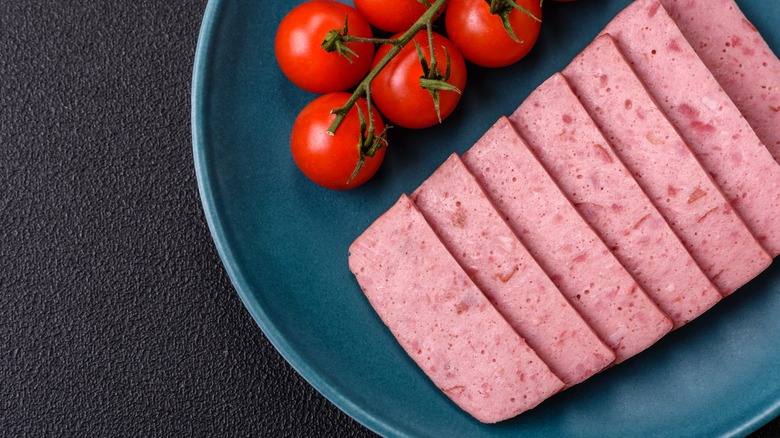 sliced spam with vine tomatoes