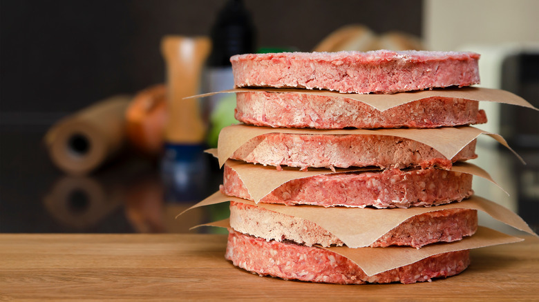 Pile of frozen hamburger patties 