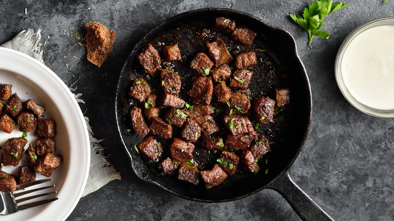 Steak bites in a frying pan