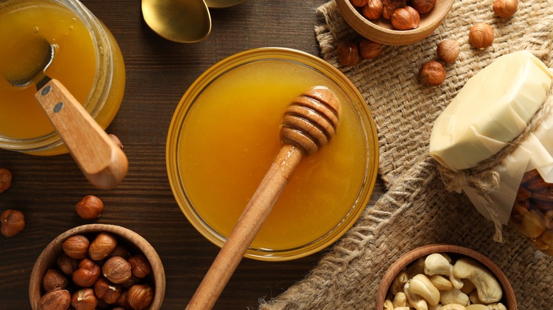 honey and nuts on table