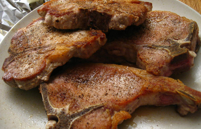 Dry Rubbed Porterhouse Pork Chops with Steakhouse Butter