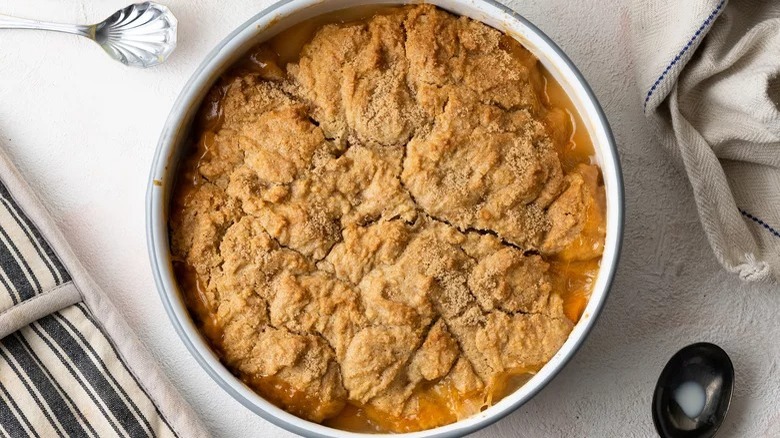 Peach cobbler in round dish