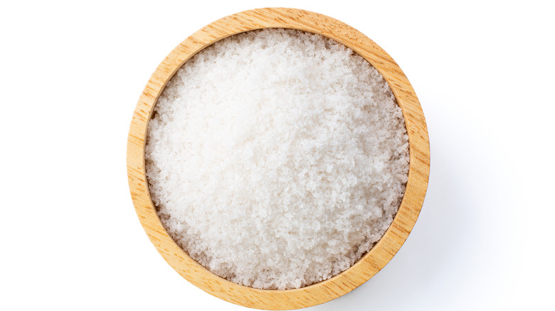 flakey sea salt in wooden bowl