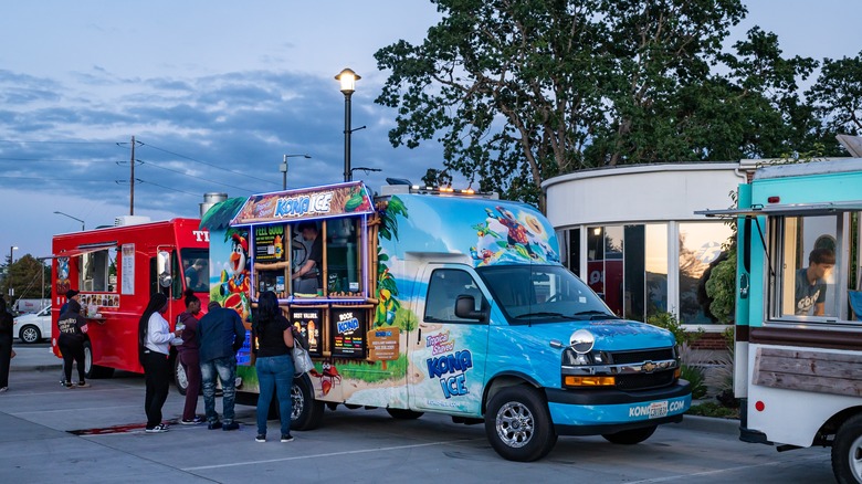 group outside of kona ice truck