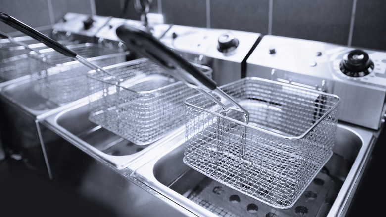 Fry baskets in restaurant kitchen