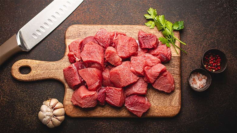 raw meat on cutting board