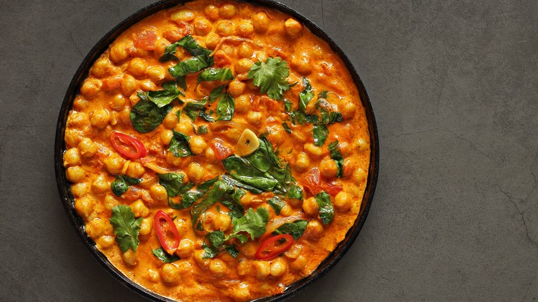 Pot of chickpeas in red sauce