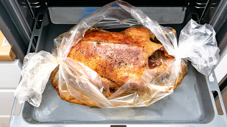 Rotisserie chicken in plastic wrap