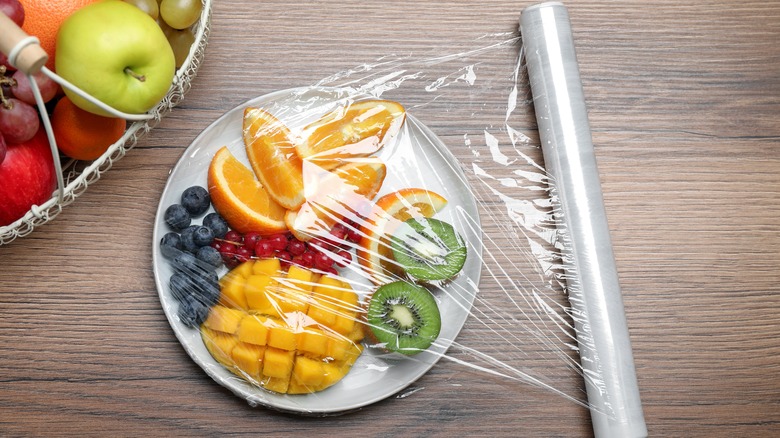 Fruit covered in plastic wrap