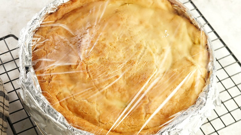 Custard covered in plastic wrap