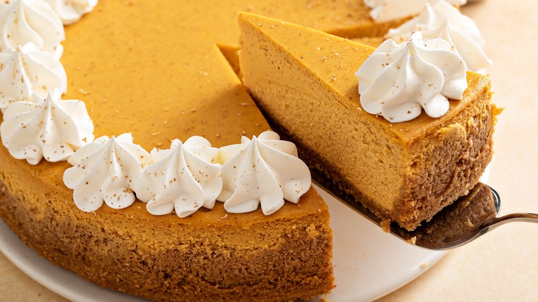 pumpkin cheesecake with whipped cream