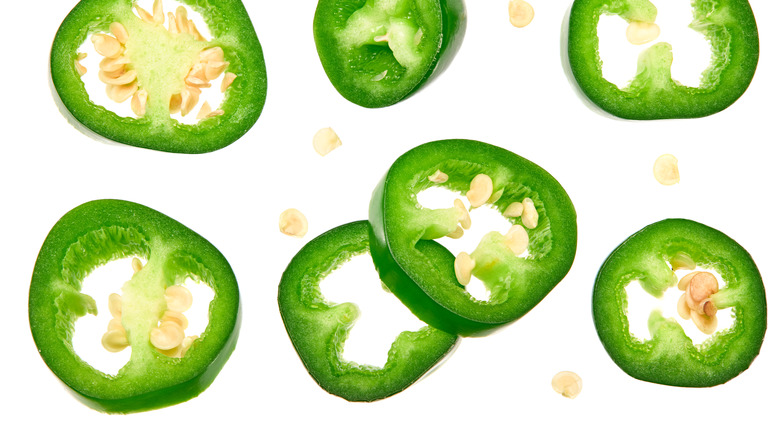 slices of green peppers with seeds