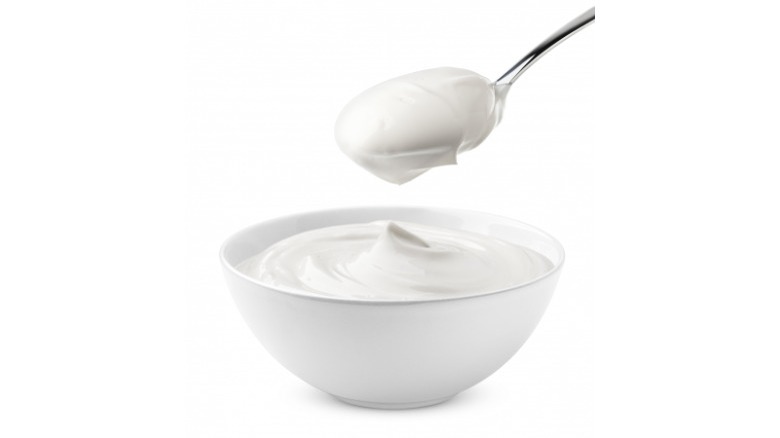 spoon and bowl of sour cream