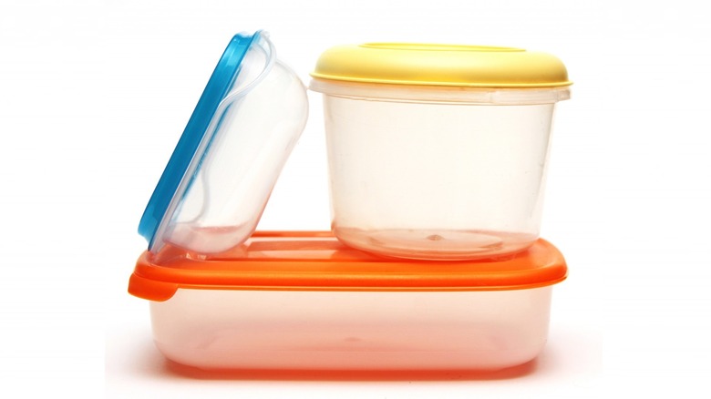 Three plastic storage containers