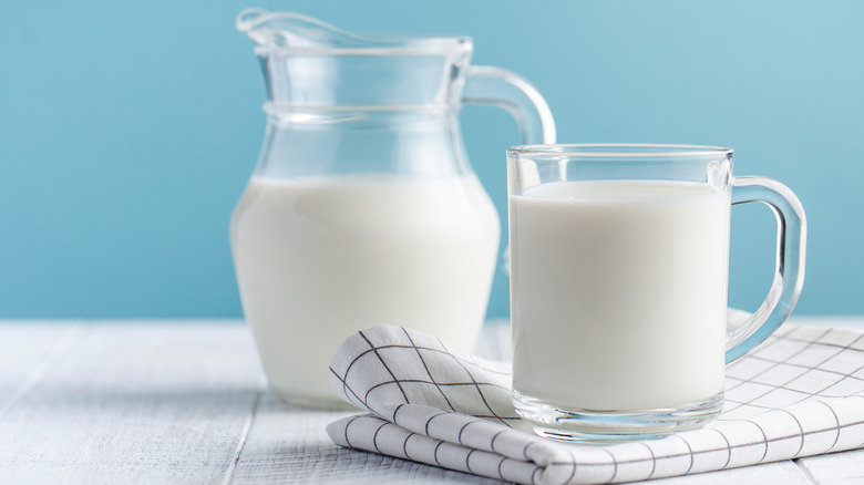 Pitcher and glass of milk