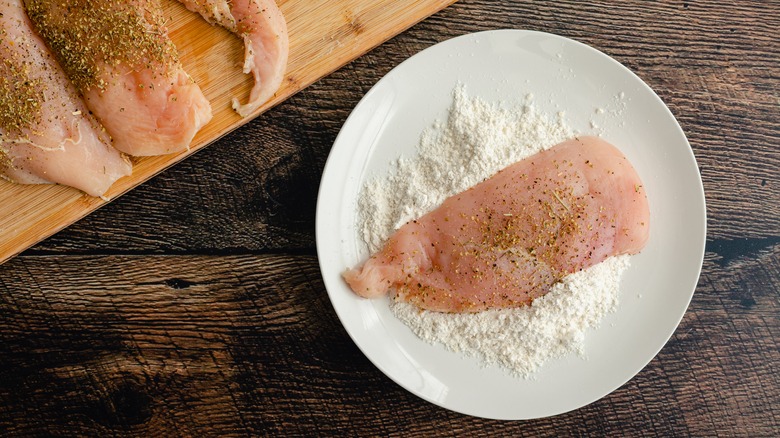 dredging chicken in flour