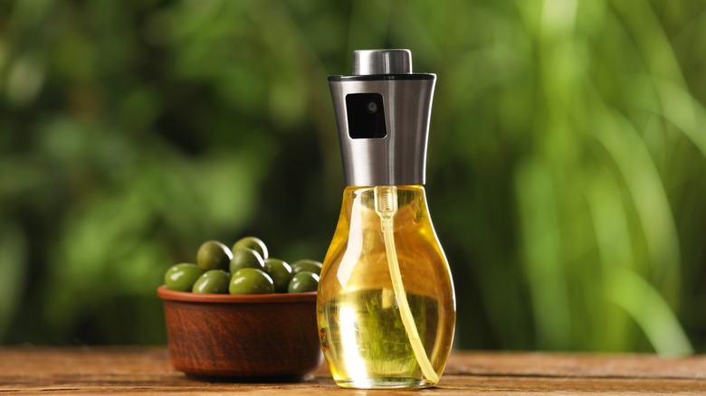 Spray bottle of olive oil