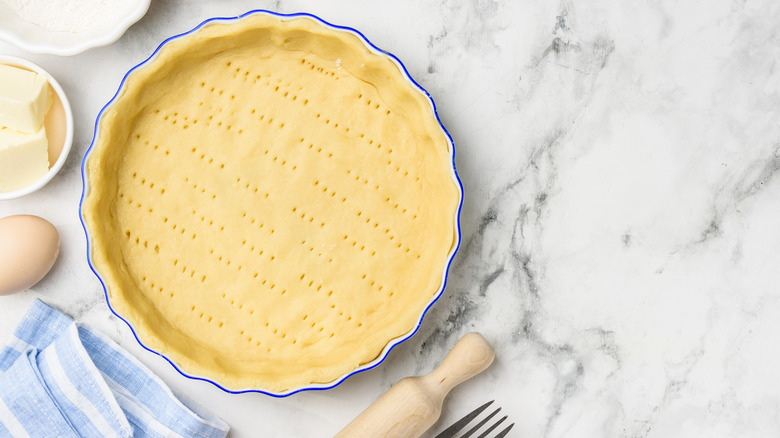 unbaked pie crust in pan