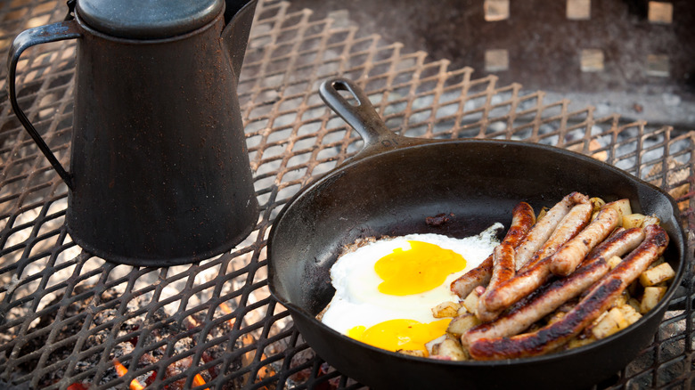 Breakfast over campfire