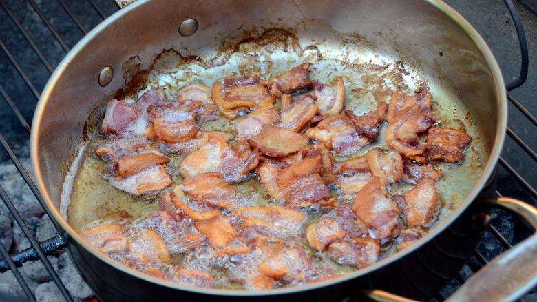 Bacon in stainless steel pan