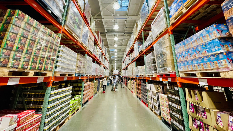 Shoppers in a Costco aisle