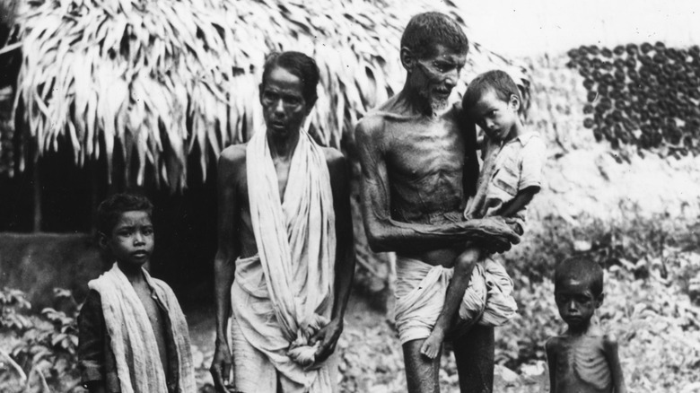 group of severely emaciated people 