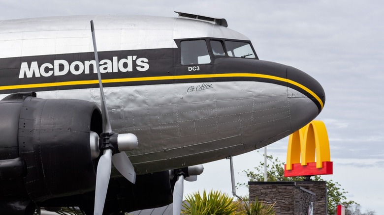 McDonald's arches and plane