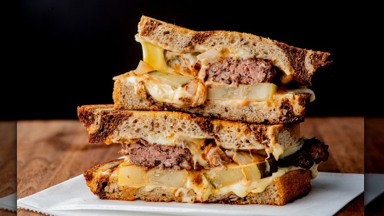 cut patty melt with pickles