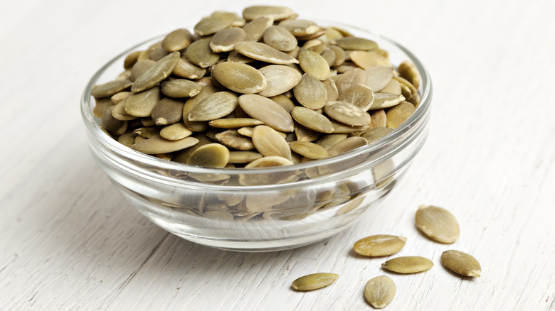 Bowl full of pumpkin seeds