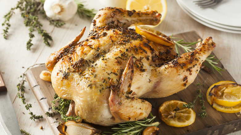 roasted chicken on cutting board