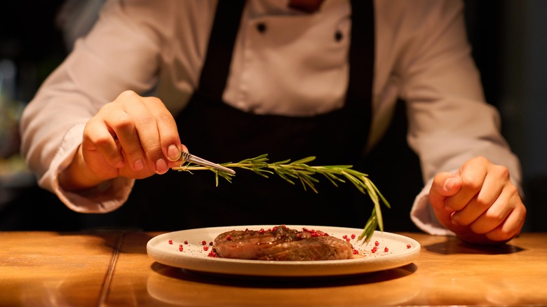 chef preparing steak