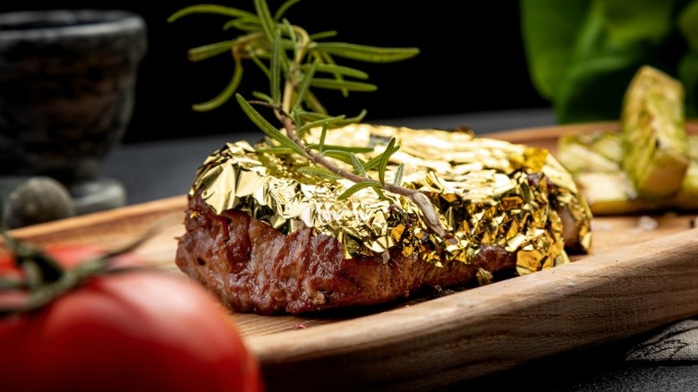 Gold garnished steak