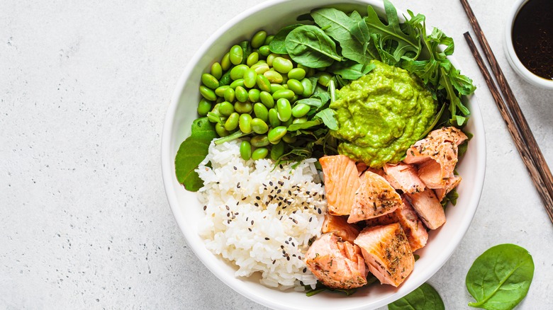 Salmon bowl with rice and vegetables