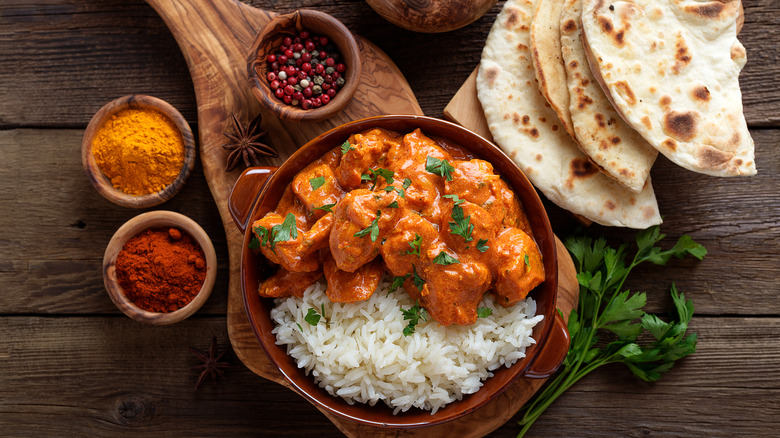 Tikka masala, rice, spices, and pita bread