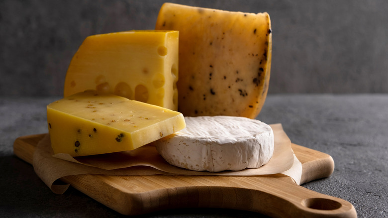 cheeses on cutting board