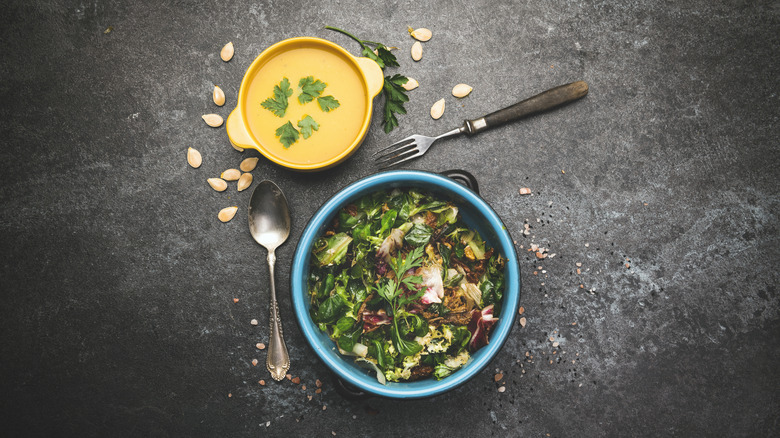 Bowl of soup and a bowl of salad