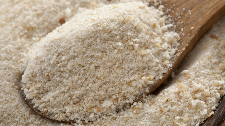 Breadcrumbs in a wooden spoon