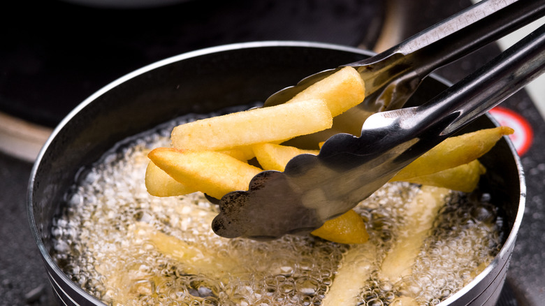 Frying french fries on stovetop