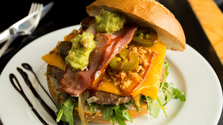 burger with jalapenos and avocado