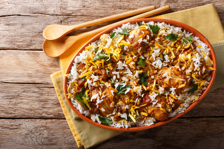 Saffron Rice Pilaf With Lamb Meatballs, Red Peppers, and Dates 