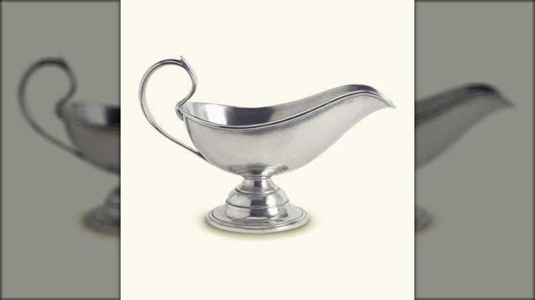 A pewter Match gravy boat