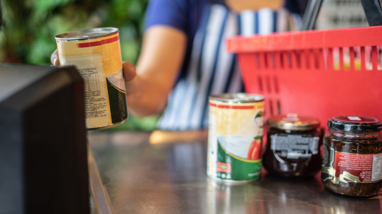 cashier scanned canned food