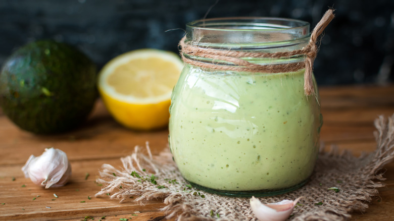 Jar of avocado dressing