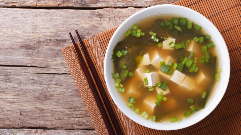 tofu miso soup and chopsticks