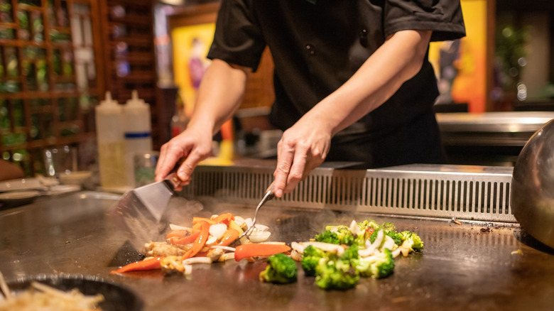 hibachi chef grilling vegetables