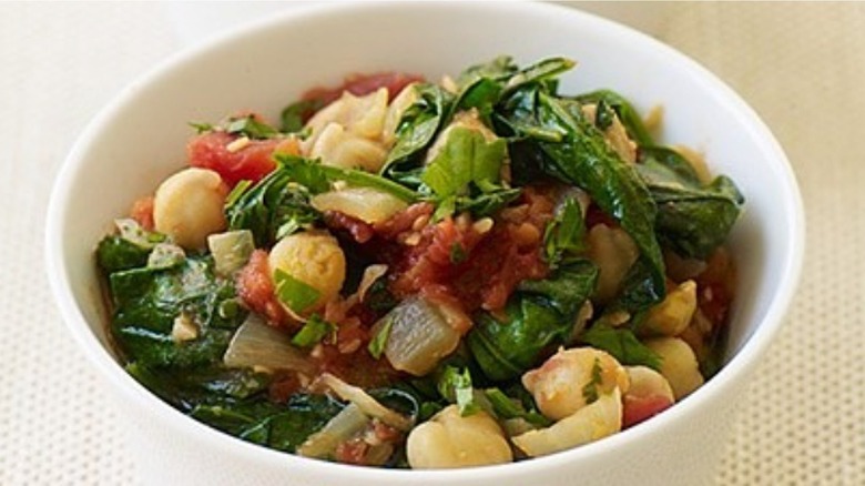 Bowl of colorful chickpea and spinach stew