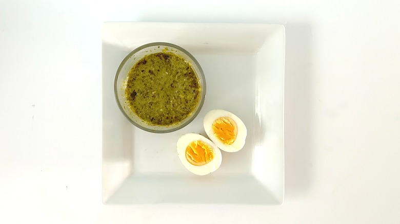 Pesto-marinated hard-boiled egg