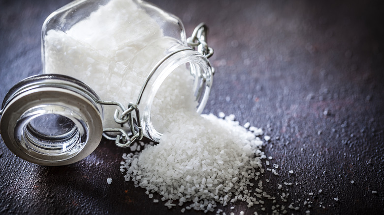 Glass container spilling salt